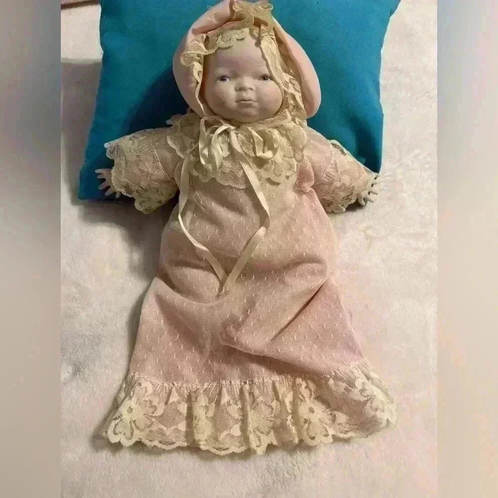 Vintage Baby Doll with Bisque head & hands with pink dress & bonnet with lace